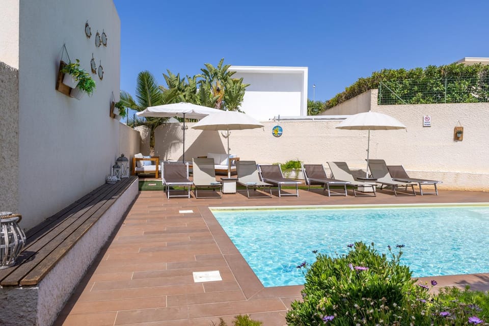 Property building, Living room, Swimming pool