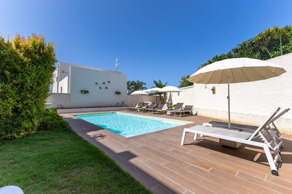Property building, Living room, Swimming pool
