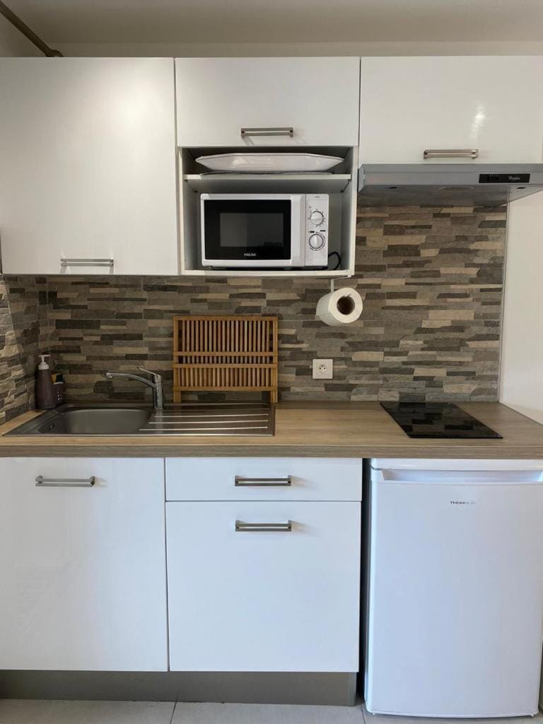 Kitchen or kitchenette, stove