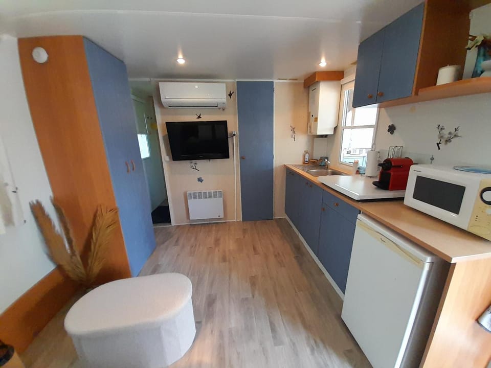 Kitchen or kitchenette, stove, toaster