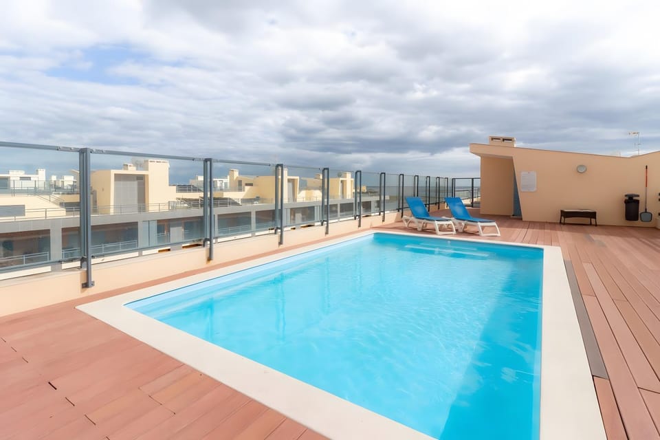 Property building, Living room, Swimming pool