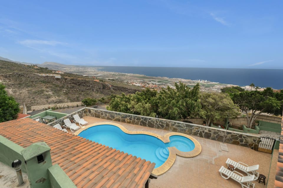 Property building, Living room, Swimming pool