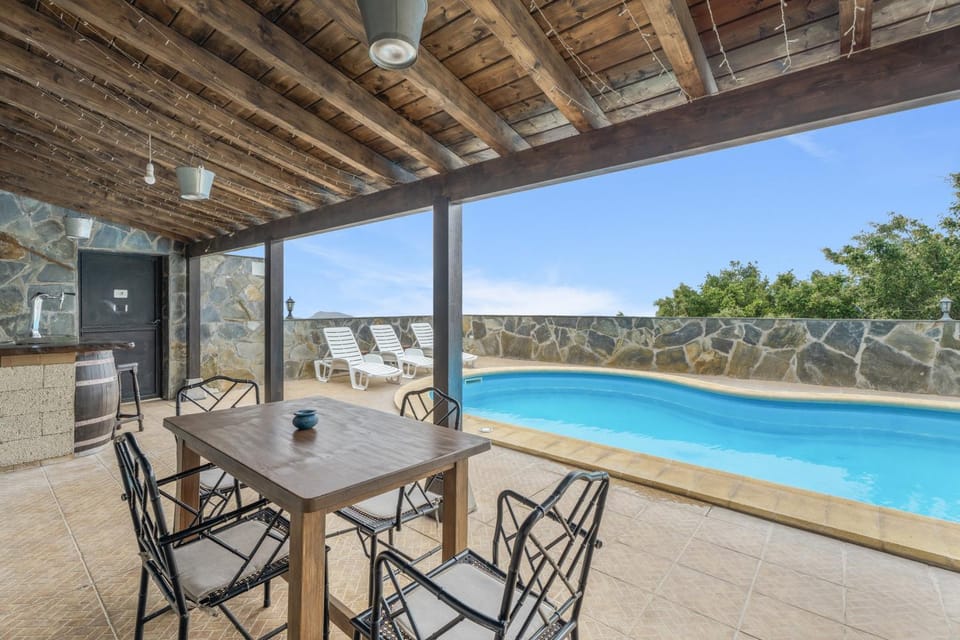 Property building, Living room, Swimming pool
