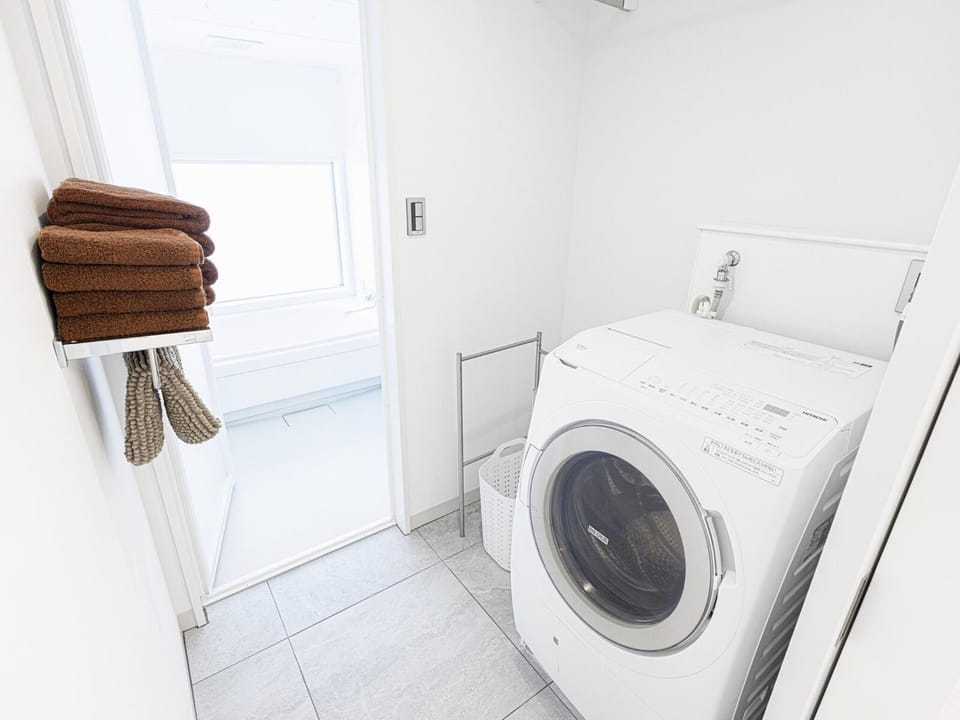 Bathroom, towels, washing machine