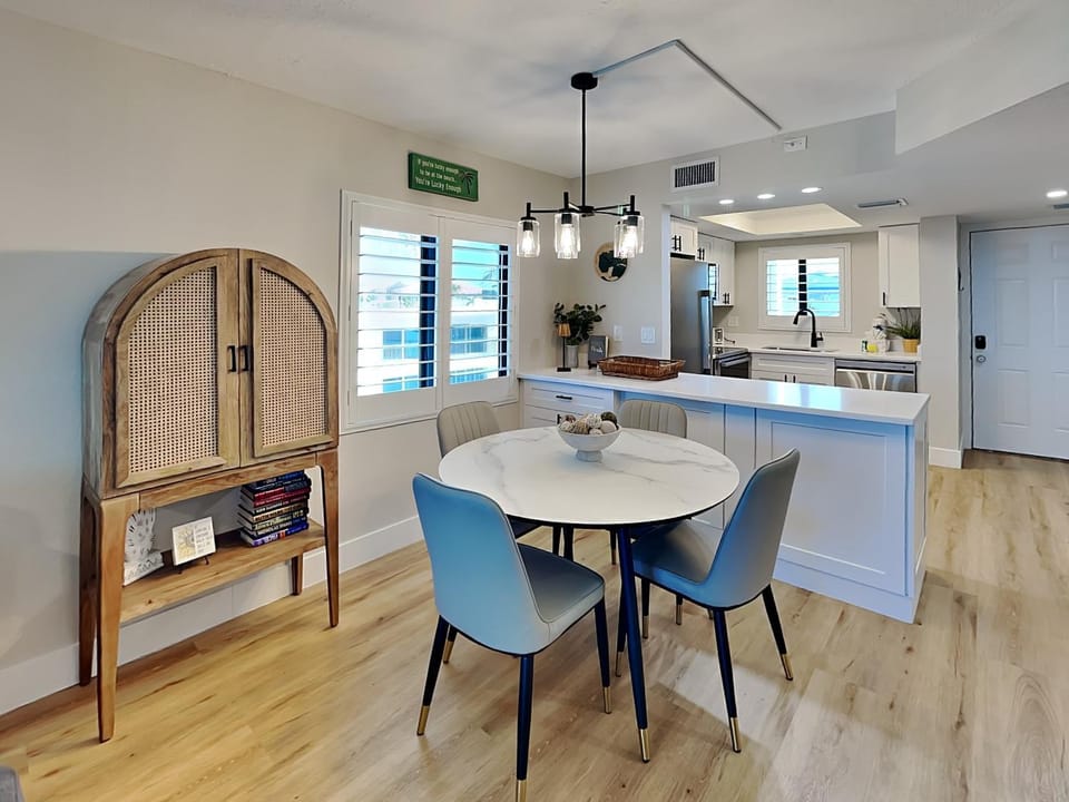 Kitchen or kitchenette, Seating area, Dining area, furniture, air conditioner
