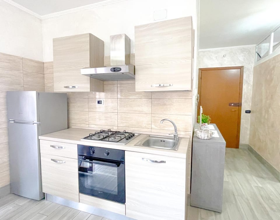 Kitchen or kitchenette, oven, stove