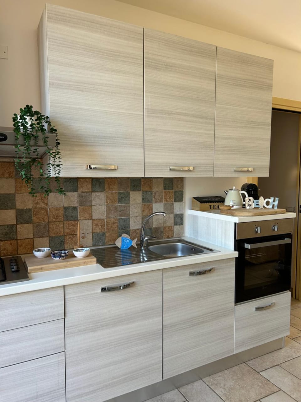 Kitchen or kitchenette, stove