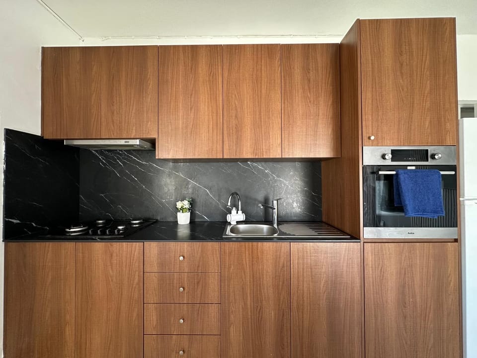 Kitchen or kitchenette, stove