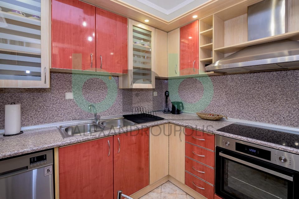 Kitchen or kitchenette, dishwasher, oven, stove, toaster