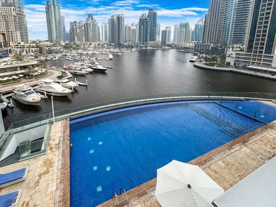 Property building, Day, Natural landscape, City view, Pool view, Swimming pool