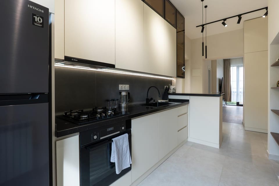 Kitchen or kitchenette, oven, stove