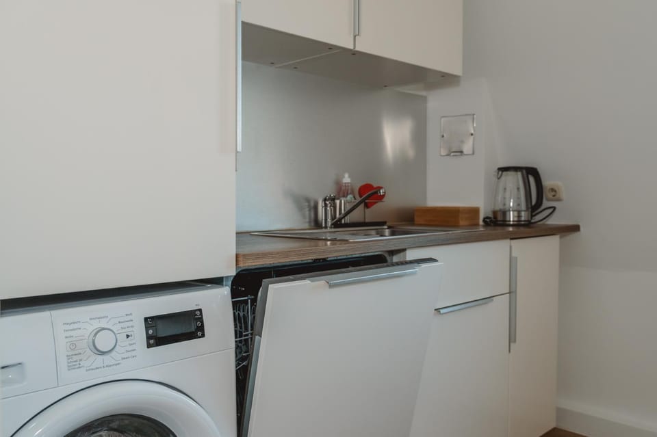 Kitchen or kitchenette, dishwasher, washing machine