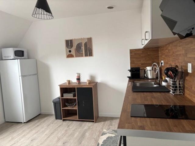 Kitchen or kitchenette, stove