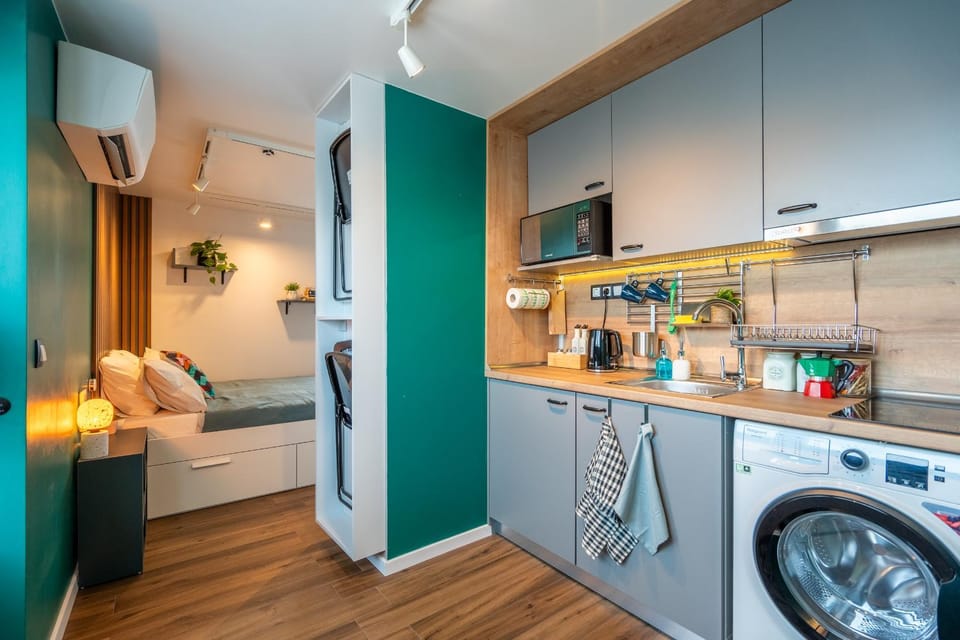 Kitchen or kitchenette, washing machine