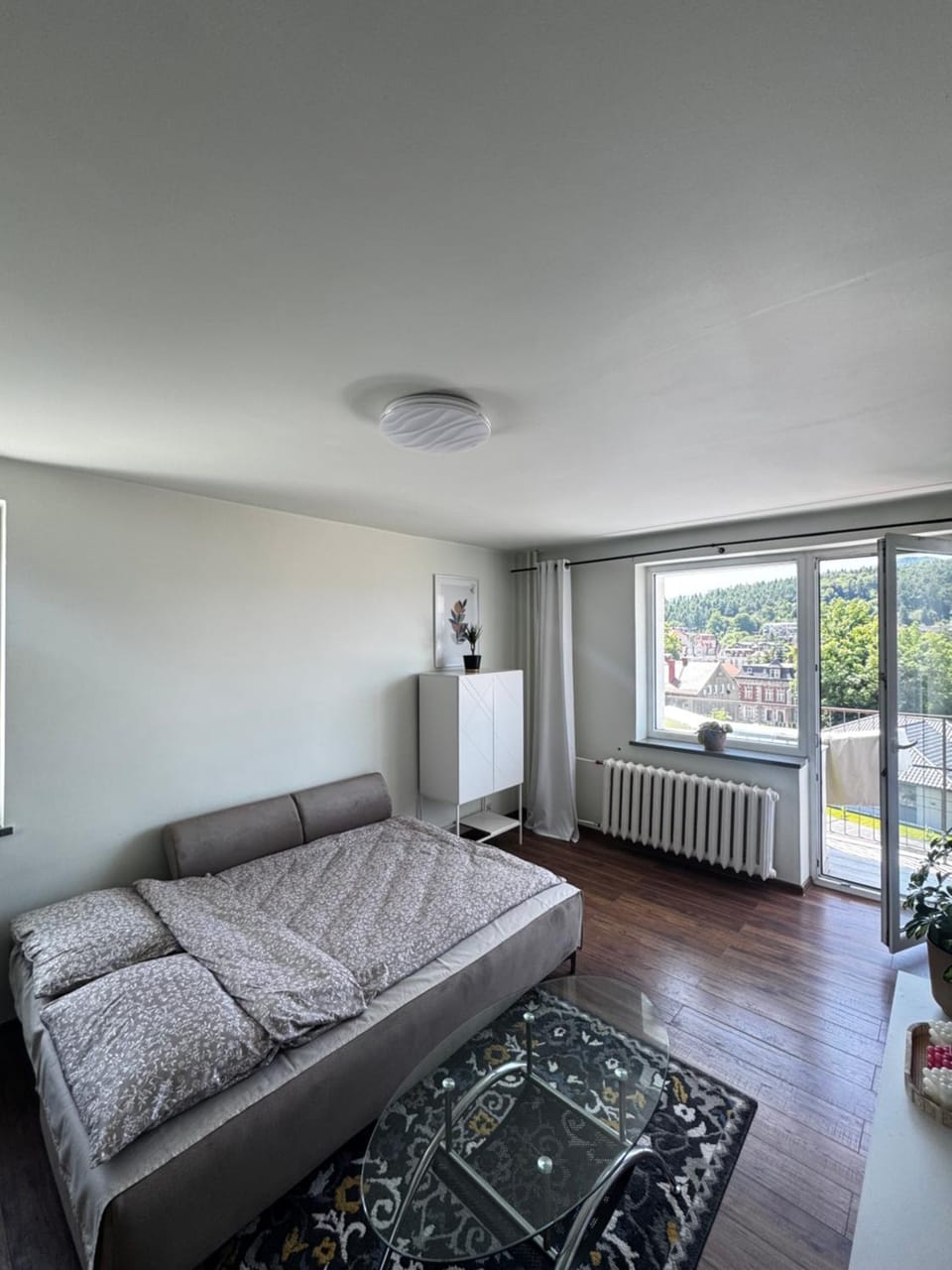 Bed, Living room, Seating area, Bedroom