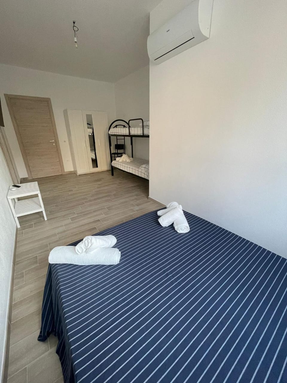 Bed, Bedroom, towels, air conditioner