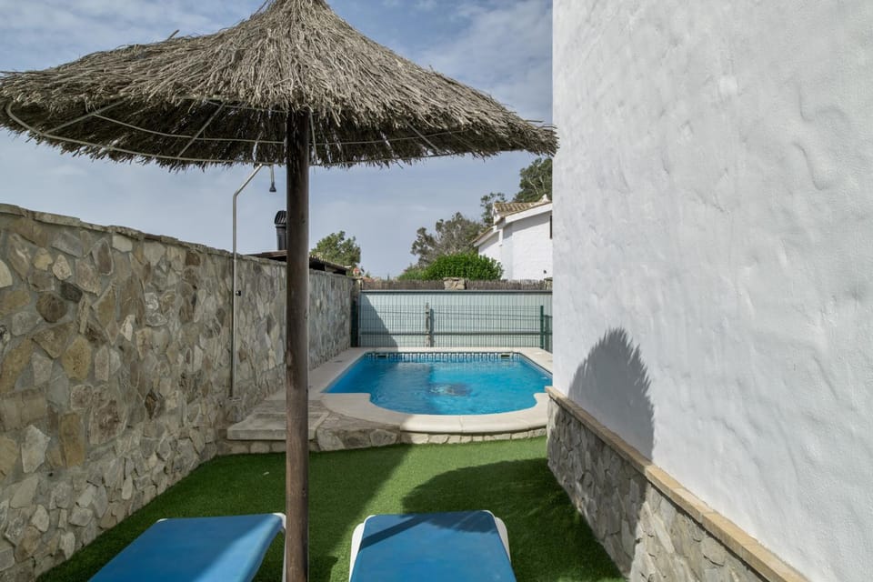 Property building, Living room, Swimming pool