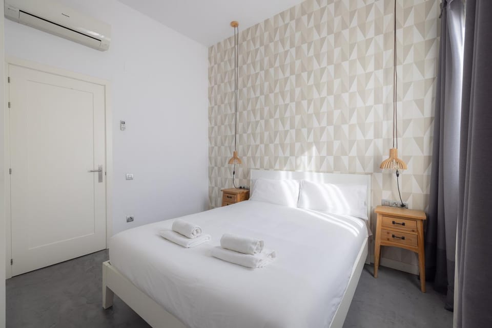 Bed, Photo of the whole room, Bedroom, towels, air conditioner