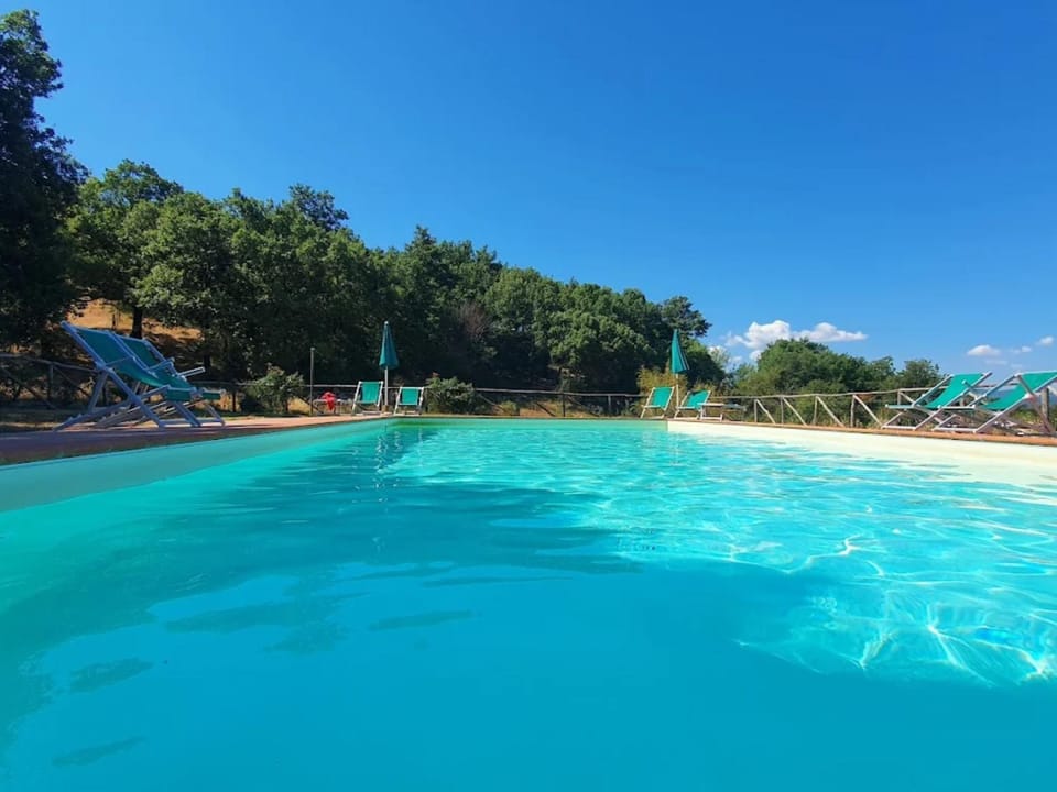 Property building, Living room, Swimming pool