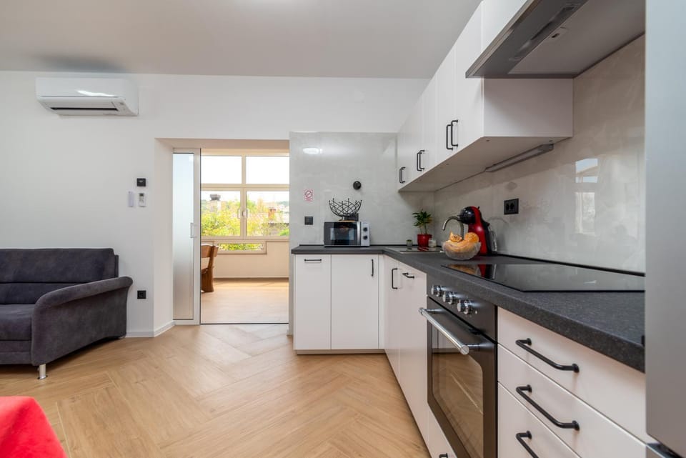 Kitchen or kitchenette, Living room, Dining area, dishwasher, microwave, oven, stove