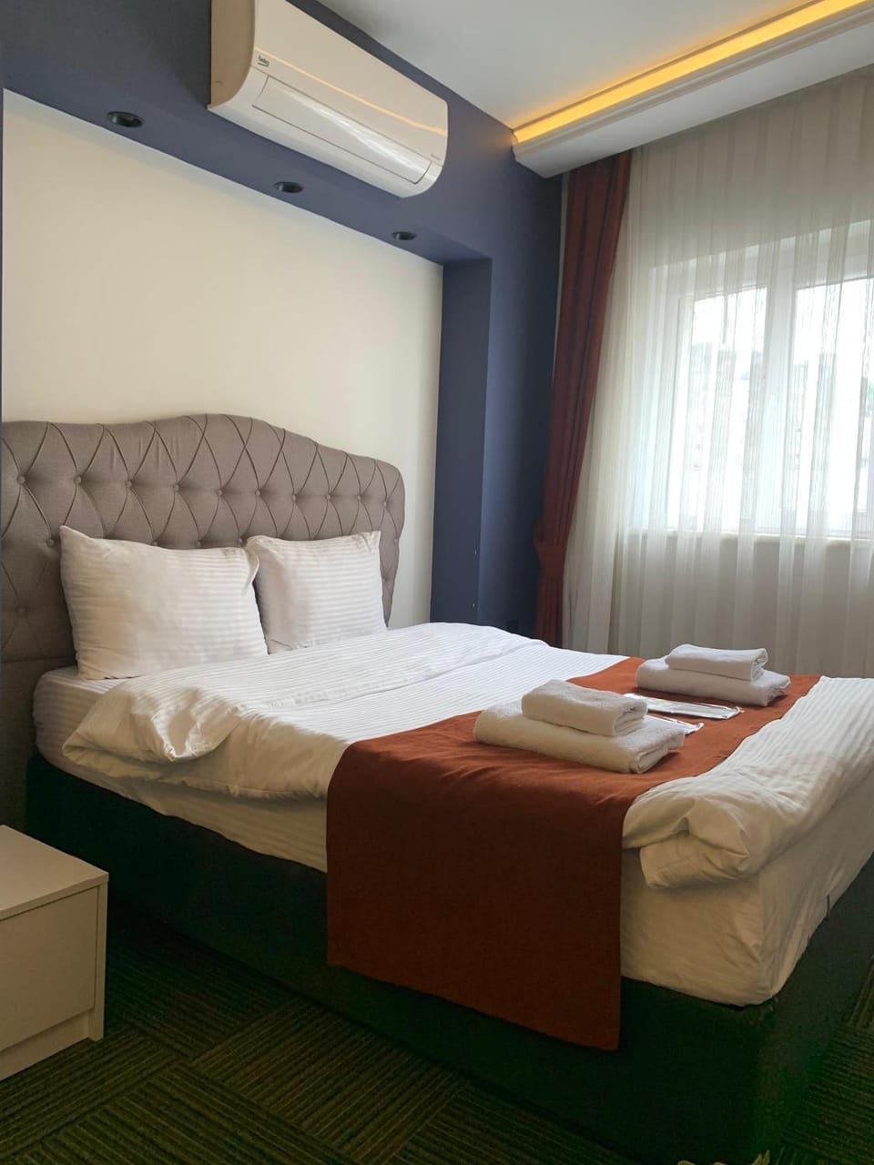 Bed, Photo of the whole room, Bedroom, towels, air conditioner