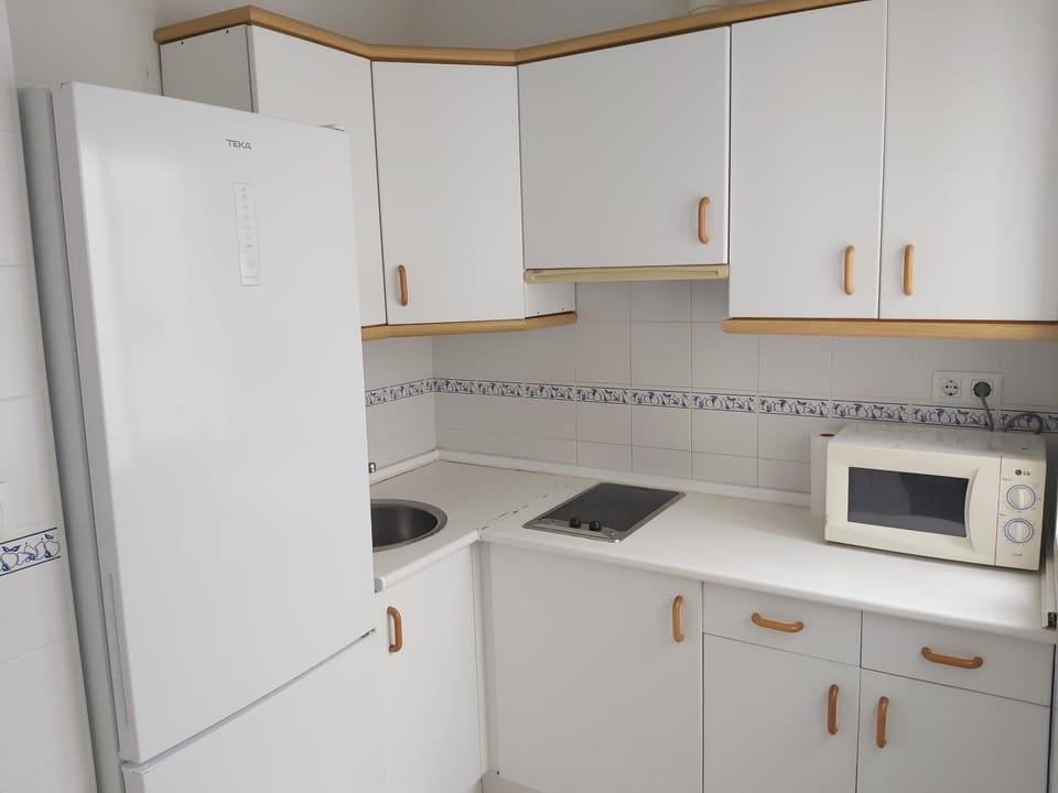Kitchen or kitchenette, oven, stove, toaster