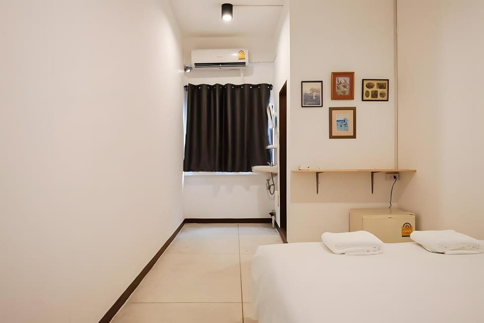 Bed, Photo of the whole room, Bedroom, towels, air conditioner