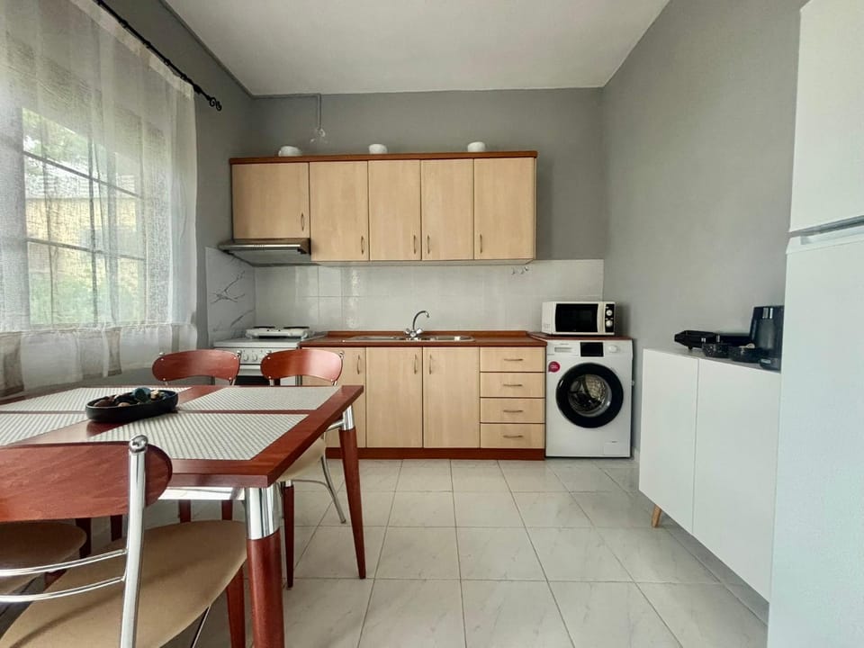Seating area, Dining area, stove, washing machine
