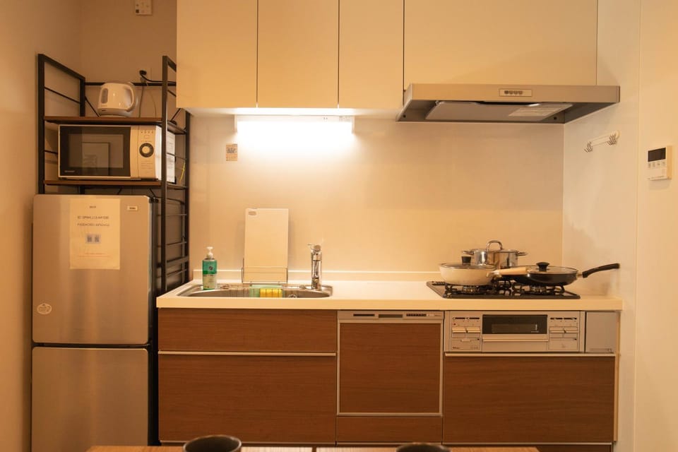 Kitchen or kitchenette, dishwasher, oven, stove, kitchen