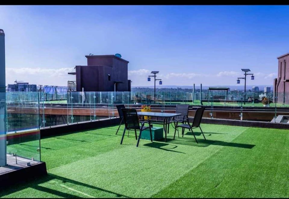 Comfort living two bedroom apartment with fully equipped gym heated swimming pool private parking space ,child play area and amazing scenic views Apartment in Nairobi