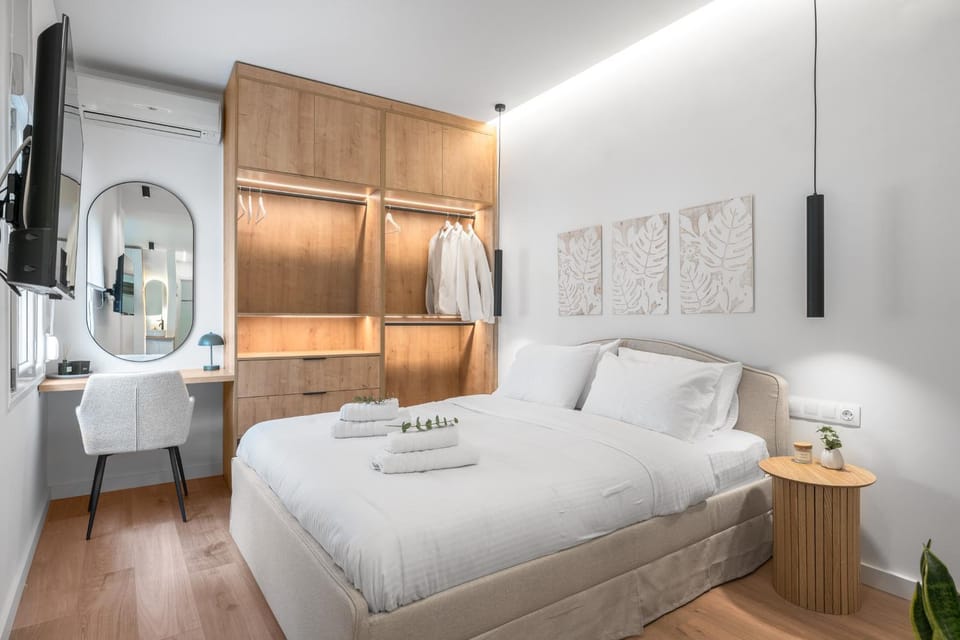 Bed, towels, wardrobe