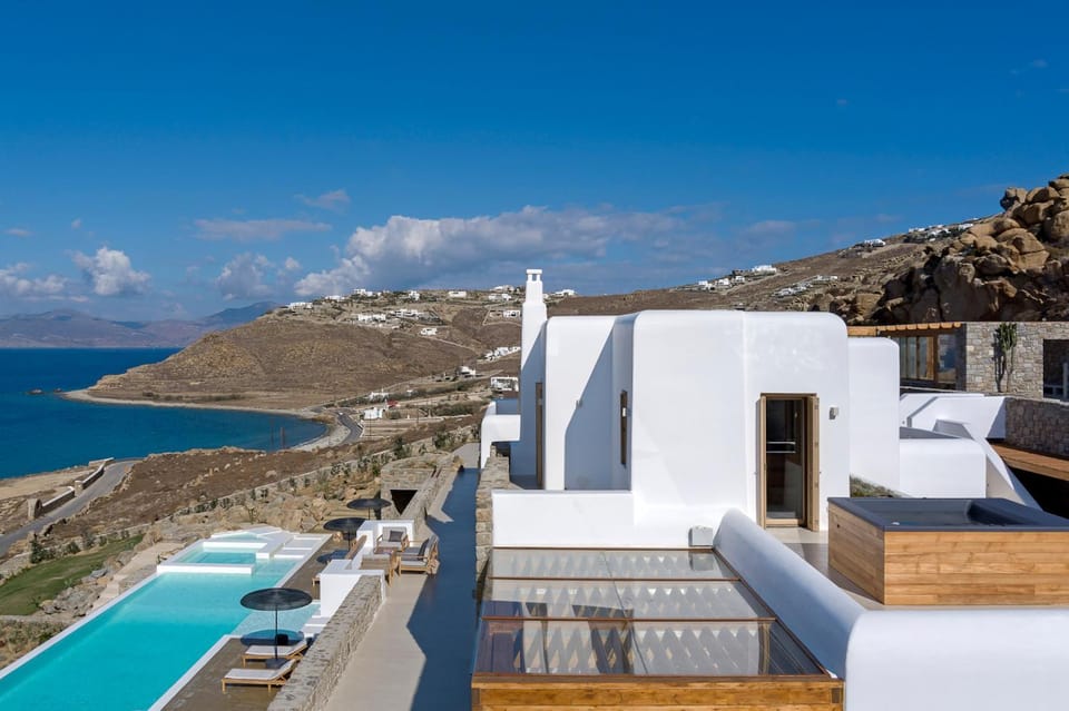 Property building, Patio, Nearby landmark, Natural landscape, View (from property/room), Balcony/Terrace, Pool view, Sea view, sunbed