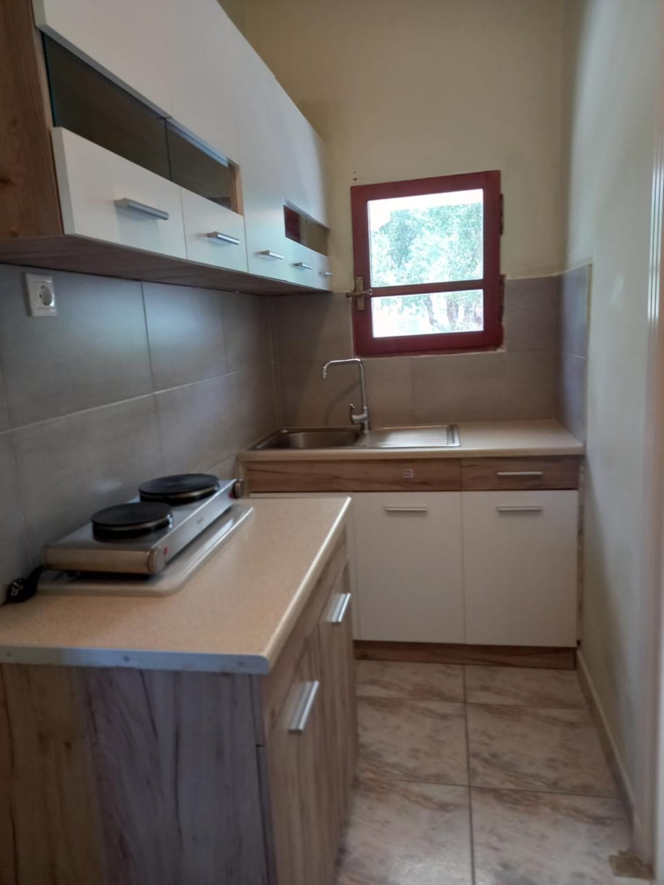 Kitchen or kitchenette, stove