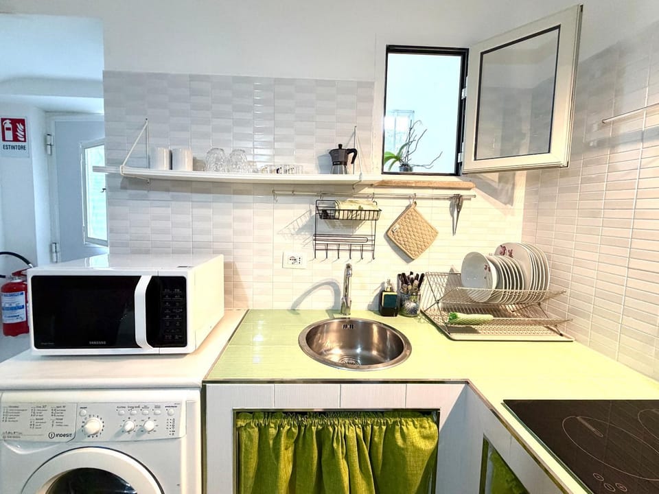 Kitchen or kitchenette, microwave