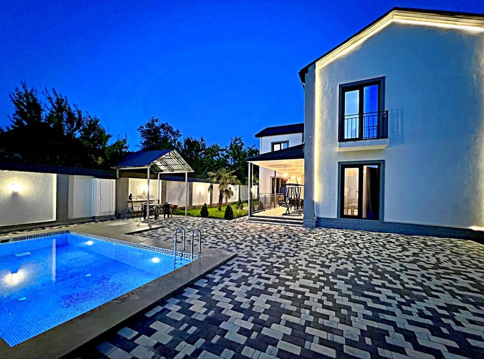 Property building, Patio, Day, Night, Pool view, Swimming pool, sunbed