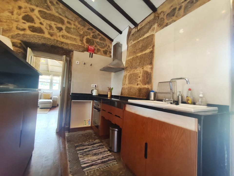 Kitchen or kitchenette, dishwasher, stove