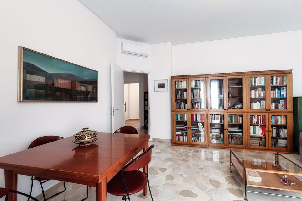 Library, Living room, Seating area, Dining area