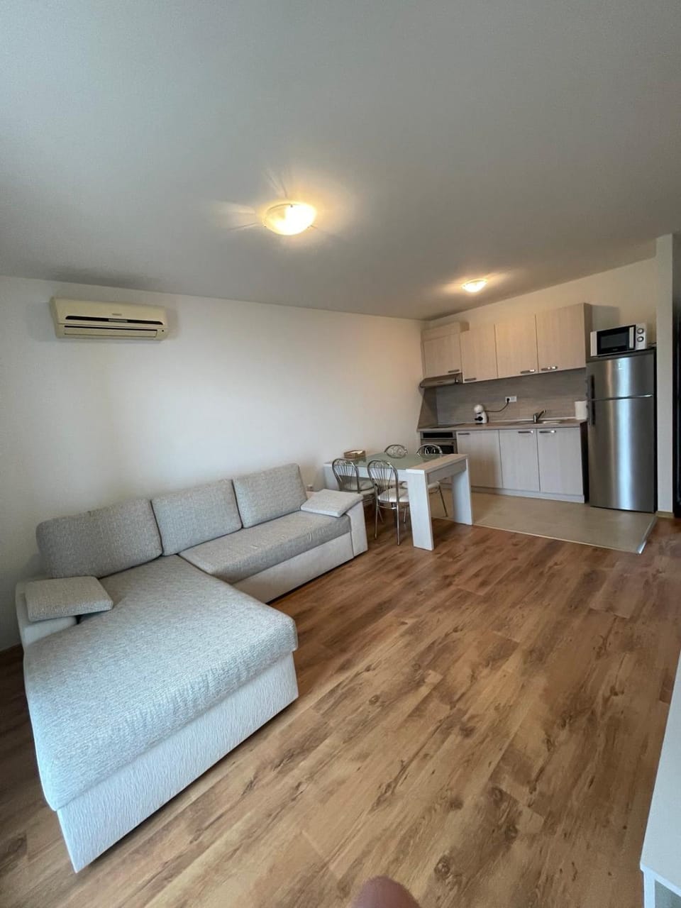 Kitchen or kitchenette, Living room, Seating area, Dining area, oven, stove, air conditioner