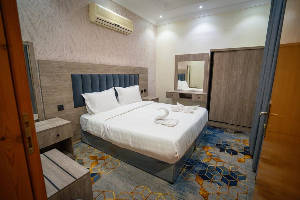 Bed, Bathroom, Photo of the whole room, Bedroom, towels, wardrobe, air conditioner