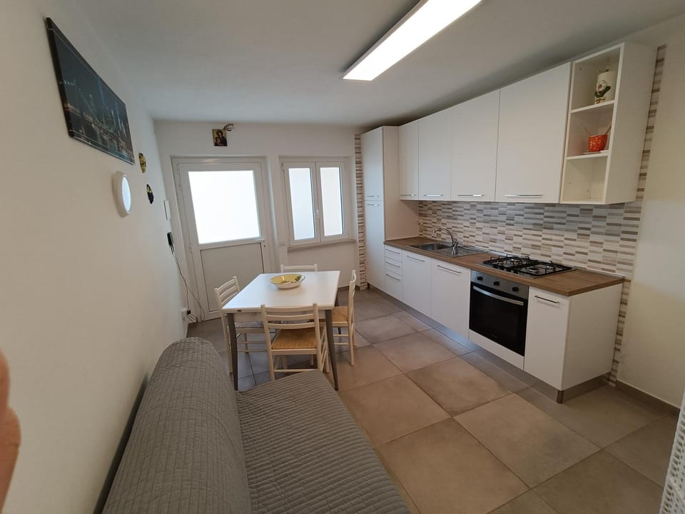Kitchen or kitchenette, Living room, Seating area, oven, stove