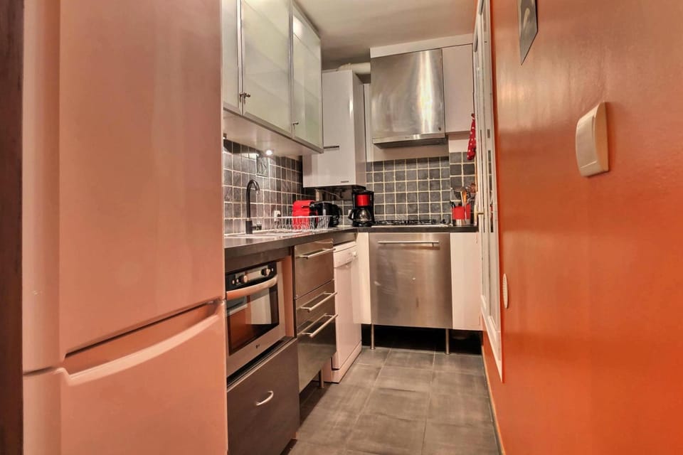 Kitchen or kitchenette, dishwasher, oven, stove, toaster