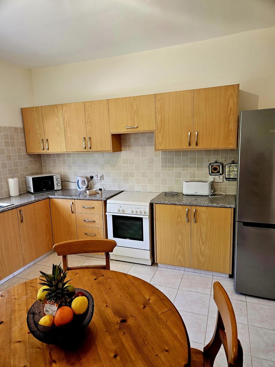 Kitchen or kitchenette, Dining area, oven, stove, toaster