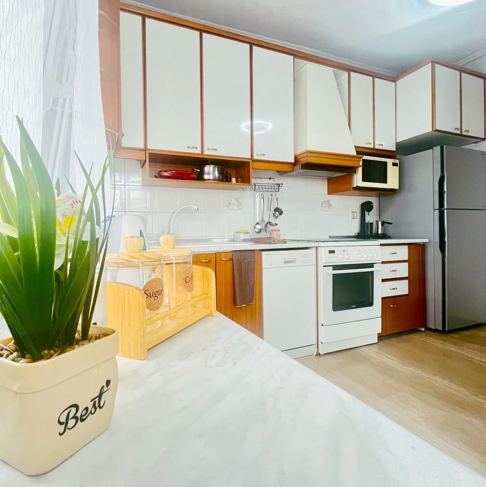 Kitchen or kitchenette, dishwasher, microwave, oven, stove, toaster