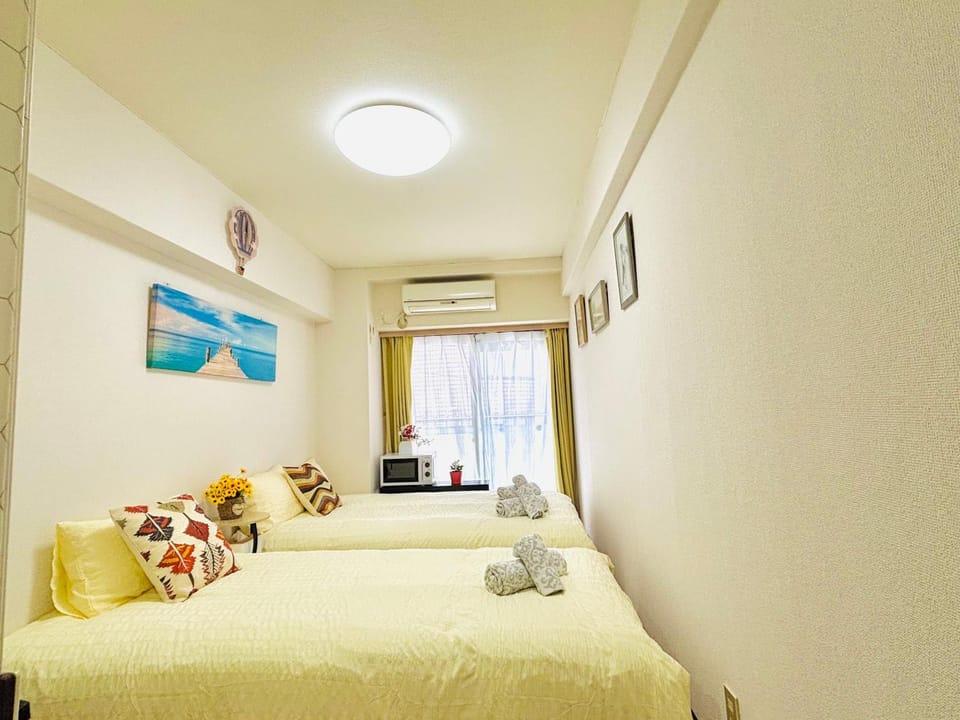 Bed, Photo of the whole room, Bedroom, towels, air conditioner