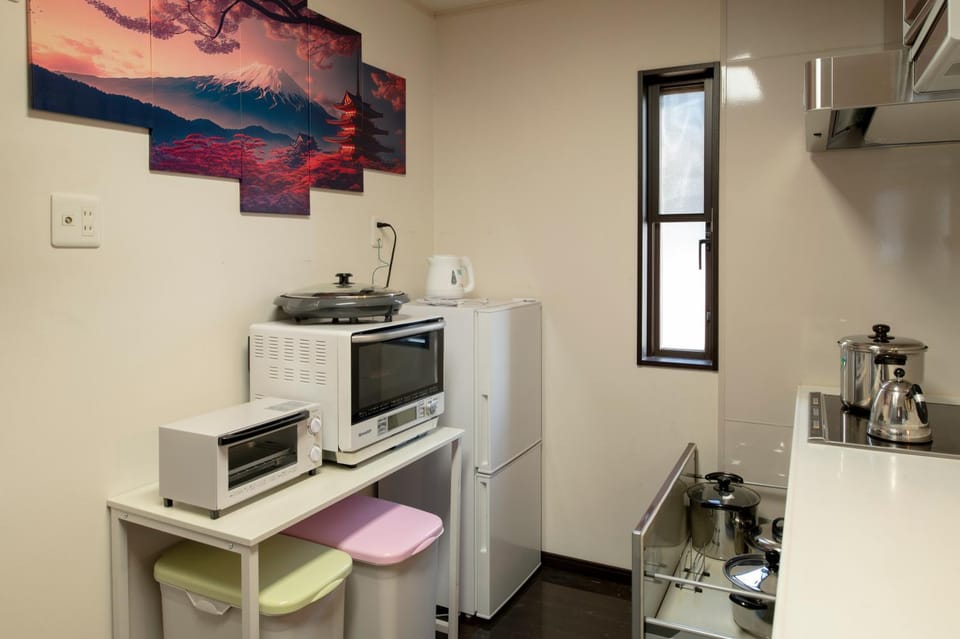 Kitchen or kitchenette, stove, toaster