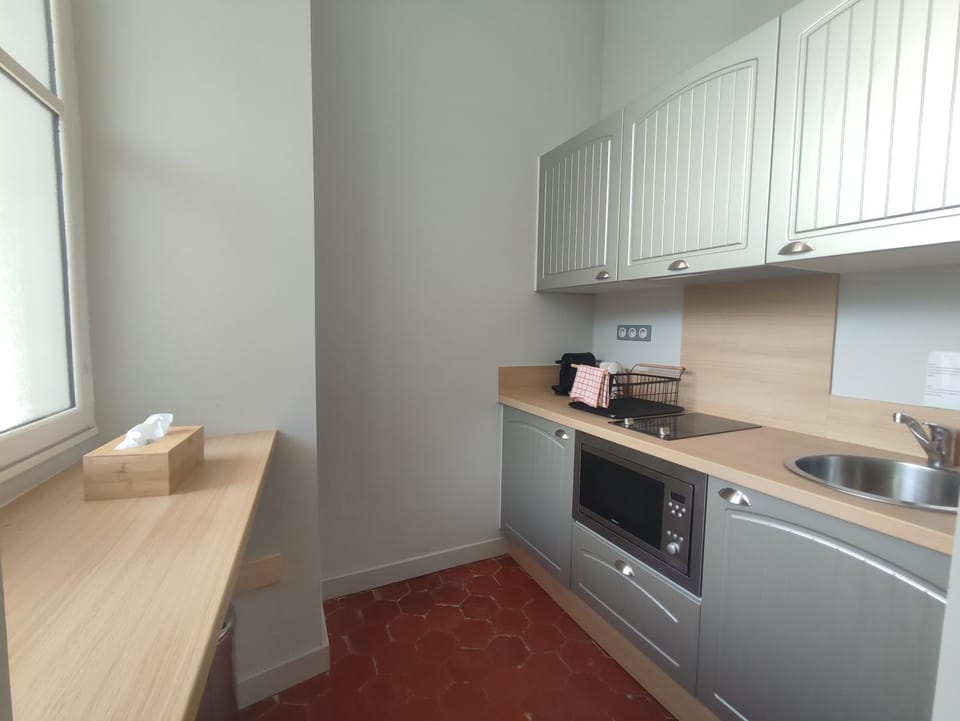 Kitchen or kitchenette, stove