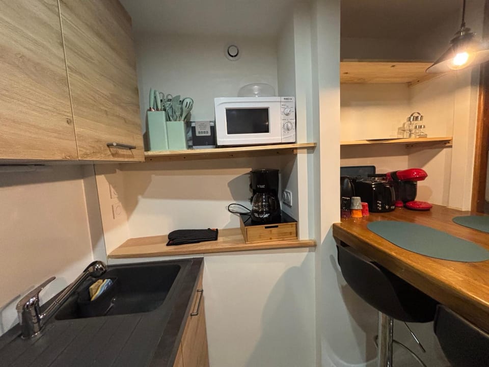 Kitchen or kitchenette, toaster
