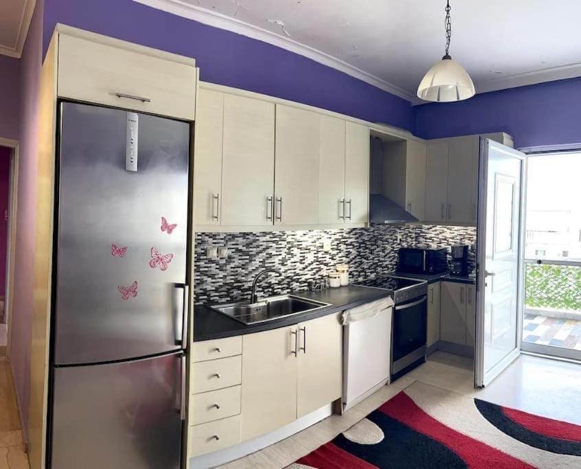 Kitchen or kitchenette, dishwasher, oven, stove