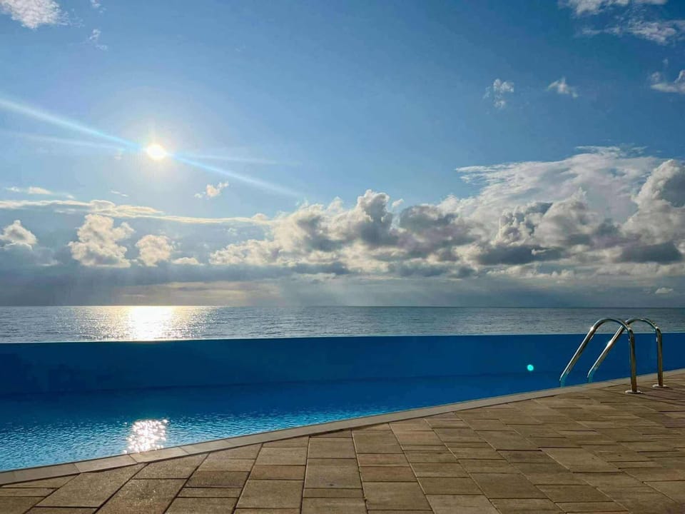 Nearby landmark, Day, Natural landscape, Pool view, Sea view, Swimming pool, sunbed