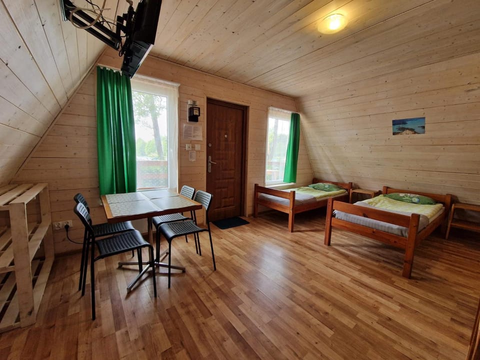 Bed, TV and multimedia, Living room, Photo of the whole room, Seating area, Dining area, Bedroom